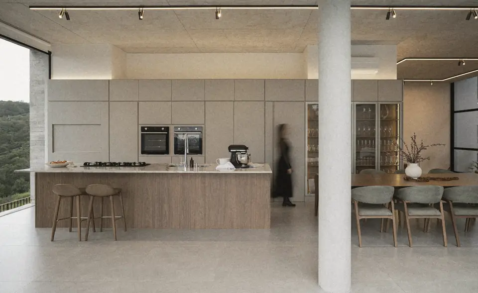 Kitchen, the pantry wall keeps it all out of sight, on the Quist site